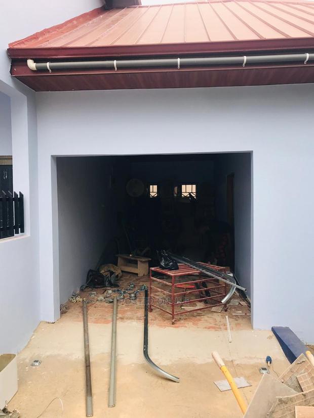 American Automatic Garage Door Now Available at Bluecity · Photo 7