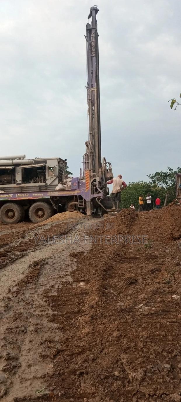 Borehole Drilling Services With Quality Pump and Blue Pipes