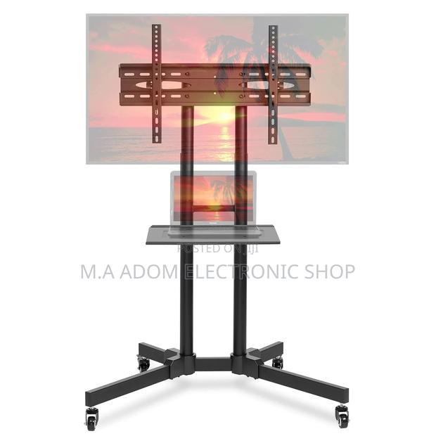 Suitable for Tv Between 32”70” Screens Size · Photo 1