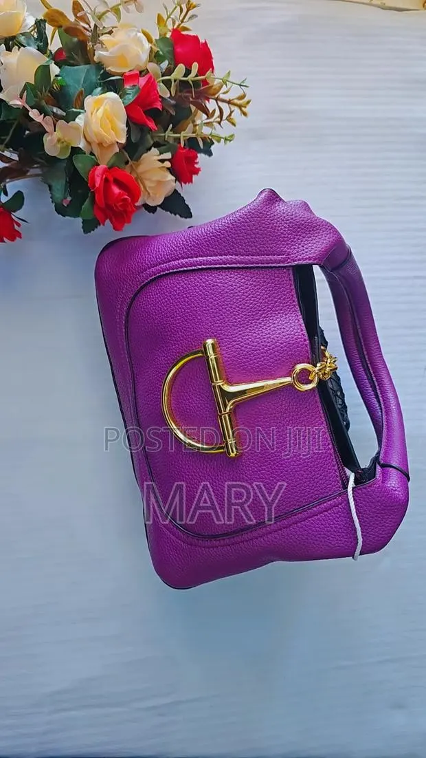 Vibrant Purple Textured Leather Shoulder Bag · Photo 1