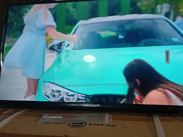 TCL 32-Inch Hd Tv With Sleek Black Finish · Photo 1