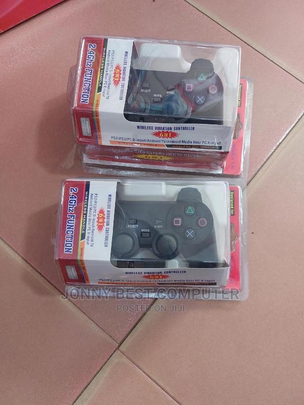 Wireless Vibration 6 In 1 Game Pad · Photo 1