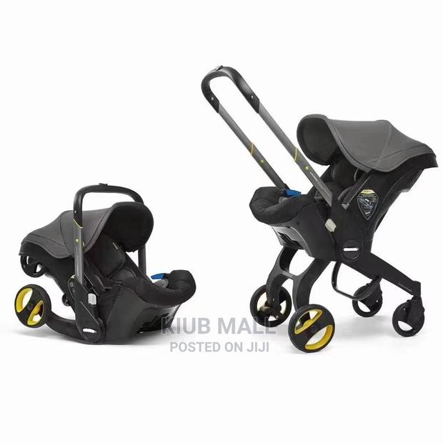 New Generation 2 in 1 Convertible Stroller/ Car Seat · Photo 1