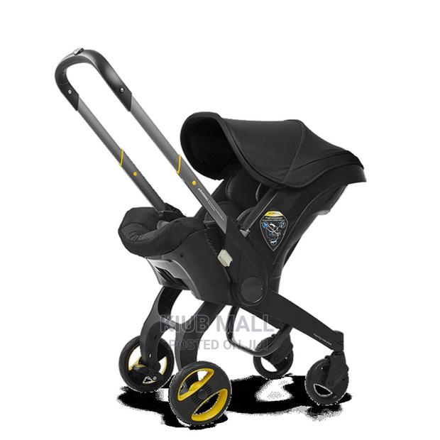 New Generation 2 in 1 Convertible Stroller/ Car Seat · Photo 2