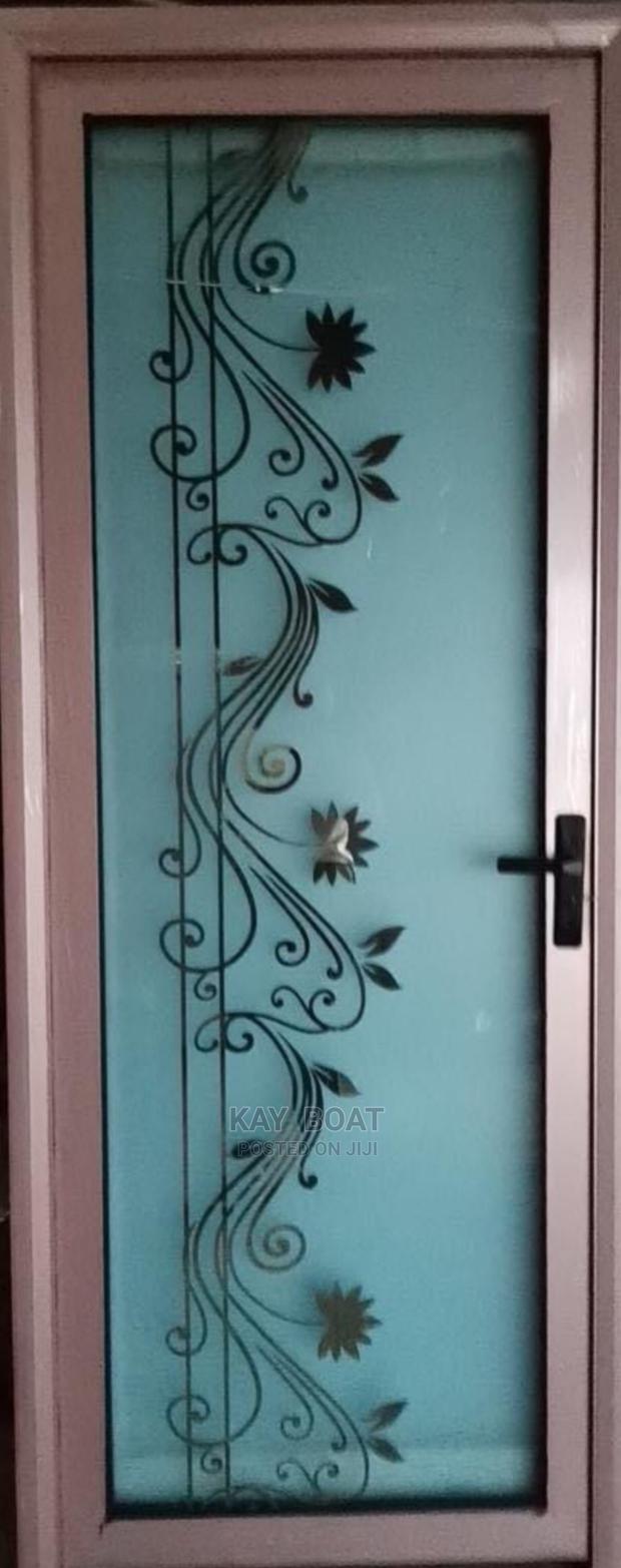 Elegant Bathroom Doors Available · Photo 1