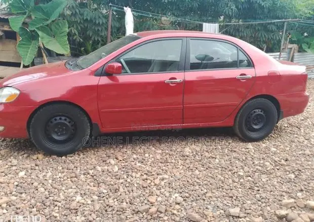 Toyota Corolla 2006 Red · Photo 1