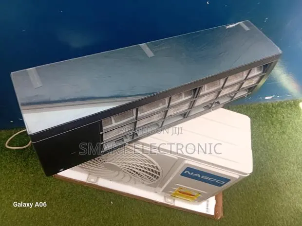 Nasco 1.5hp Mirror Air Conditioner Smart Cooling With Mirror Elegance · Photo 1