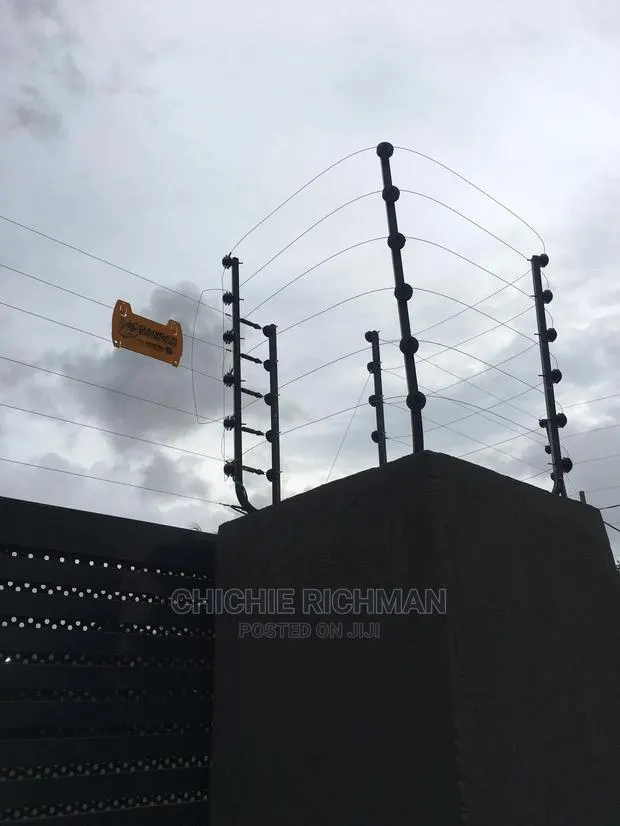 Electric Fence and Razor Wire Installation · Photo 1