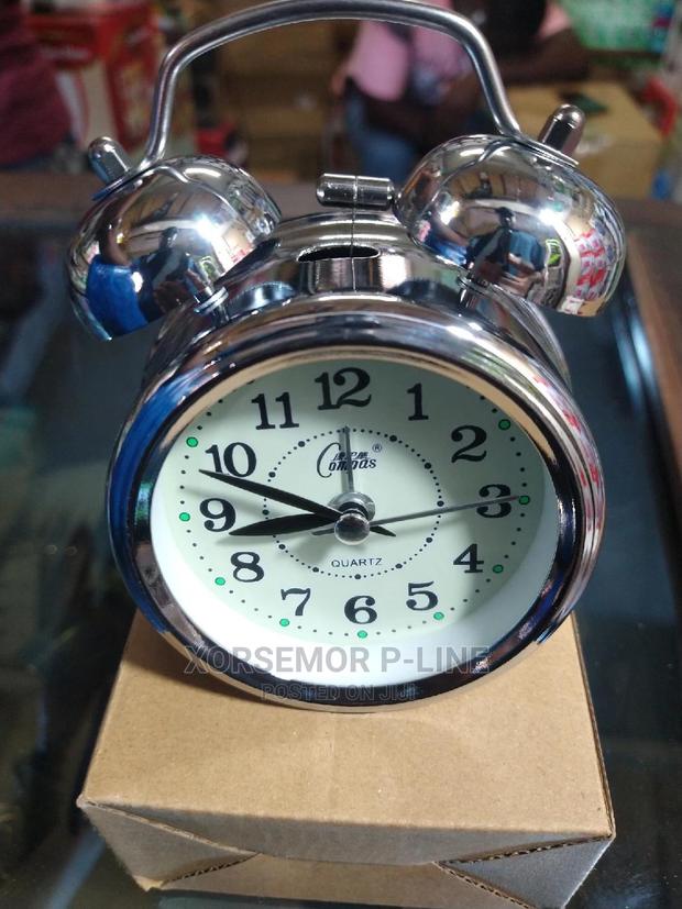 Silver Alarm Clock · Photo 1