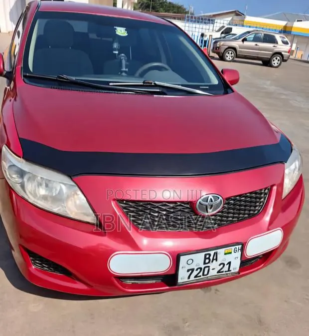 Toyota Corolla 2010 Red · Photo 1