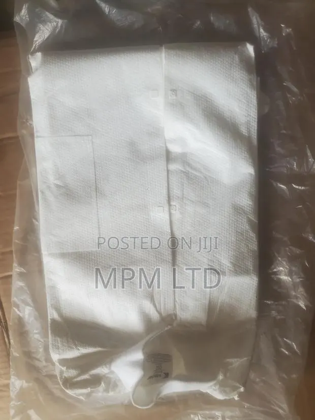 Disposable Lab Coat · Photo 1