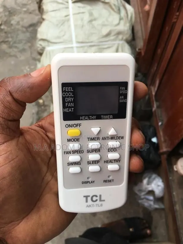 TCL AC Remote: Your Personal Climate Controller. · Photo 1