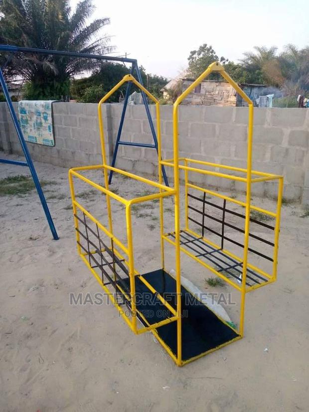 Children Swing / Seesaw / Mary Go Round · Photo 1