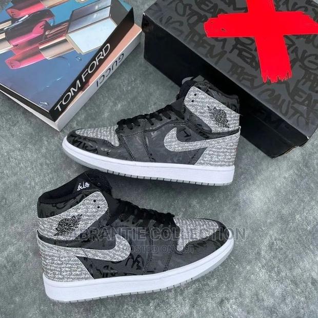 Air Jordan 1 Retro High Rebellionaire · Photo 1