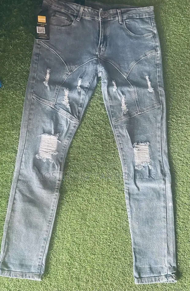Ripped Jeans Trousers for Sale Waist Size 34 in Store Now · Photo 1