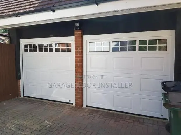 Smart Garage Doors With Fanlight and Remote Control · Photo 1