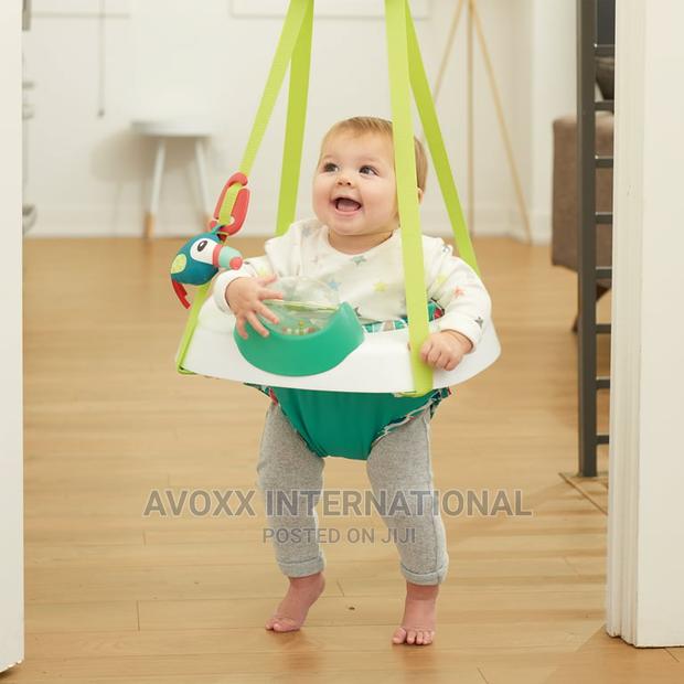 Evenflo Exersaucer Tiny Tropics2-in-1baby Seat Door Jumper · Photo 1