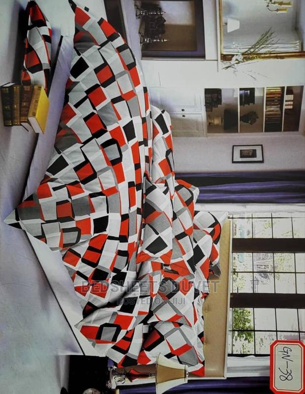 2 Cotton Sheets and 2 Pillow Cases · Photo 1
