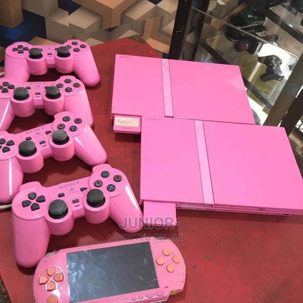 Playstation 2 2 Pads 10 Games · Photo 1
