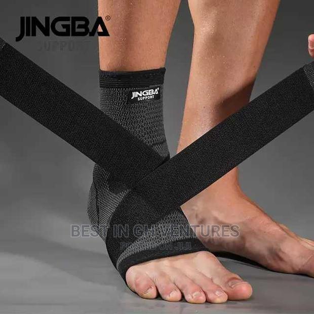 Ankle Brace With Strap Compression · Photo 1