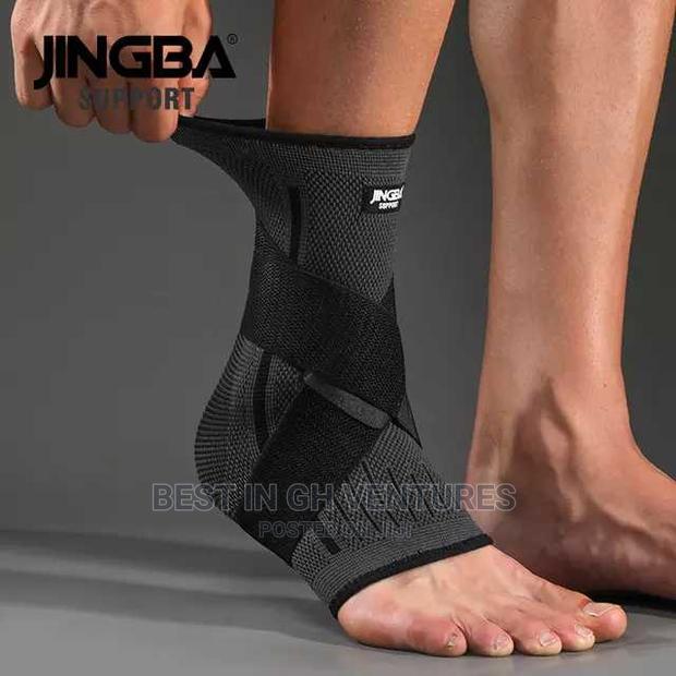 Ankle Brace With Strap Compression · Photo 2
