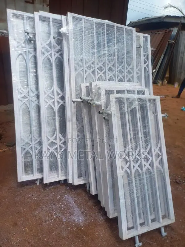 White Double Face Window Burglarproofs | Custom Made · Photo 1