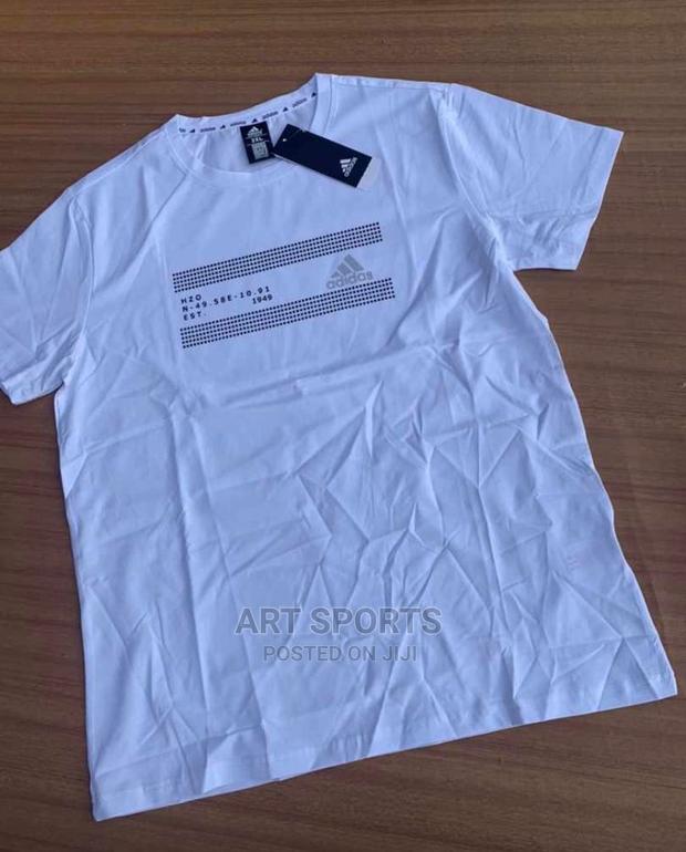 Nike Tops. · Photo 1