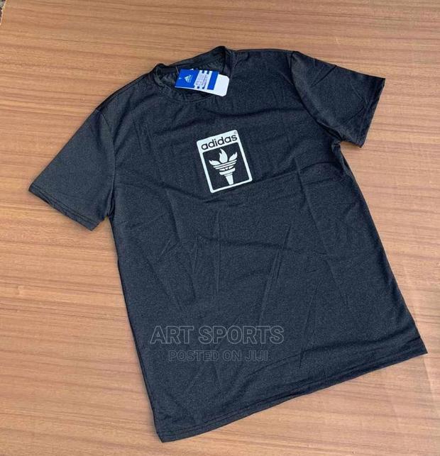 Adidas Tops · Photo 2