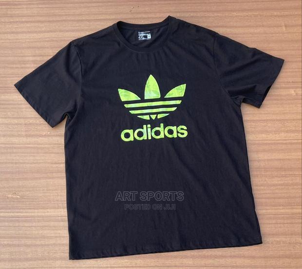 Adidas Tops. · Photo 1