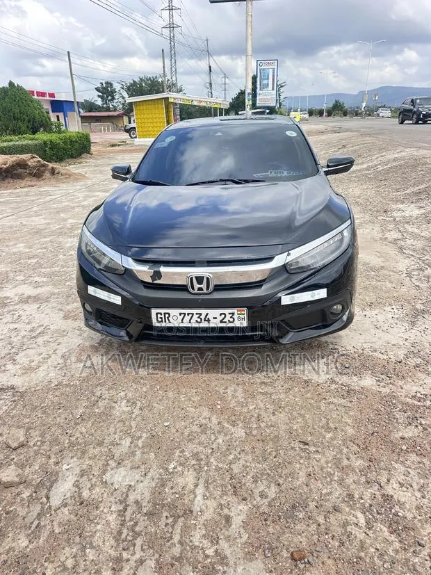 Honda Civic Touring 4dr Sedan (1.5L 4cyl) 2017 Black · Photo 1