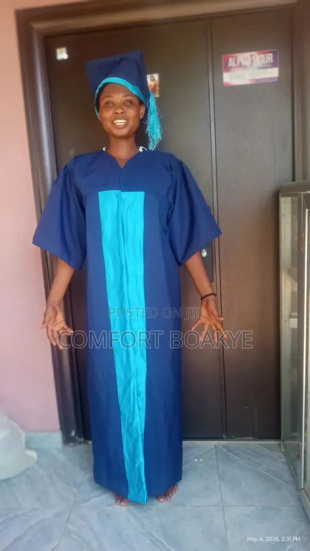 Sewing Of Graduation Gown · Photo 1