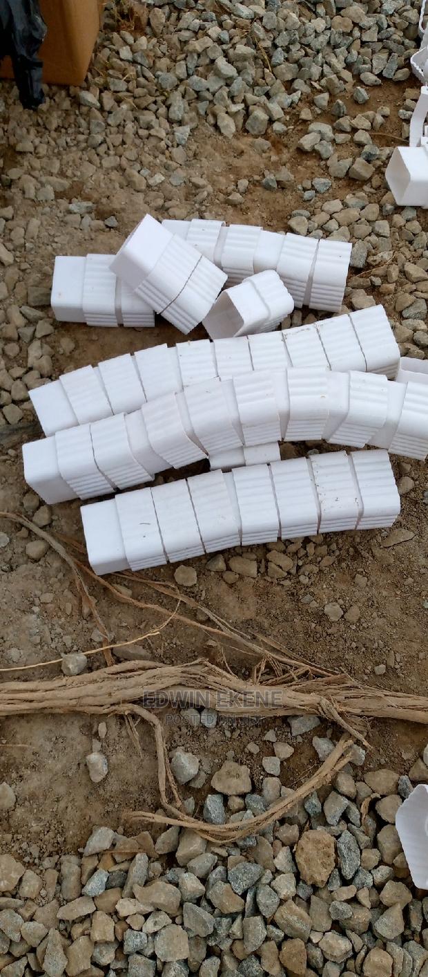 Plastic Pipe and Rain Gutters · Photo 2