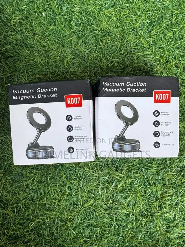 Multifunctional Magnetic Vacuum Suction Car Phone Holder · Photo 1
