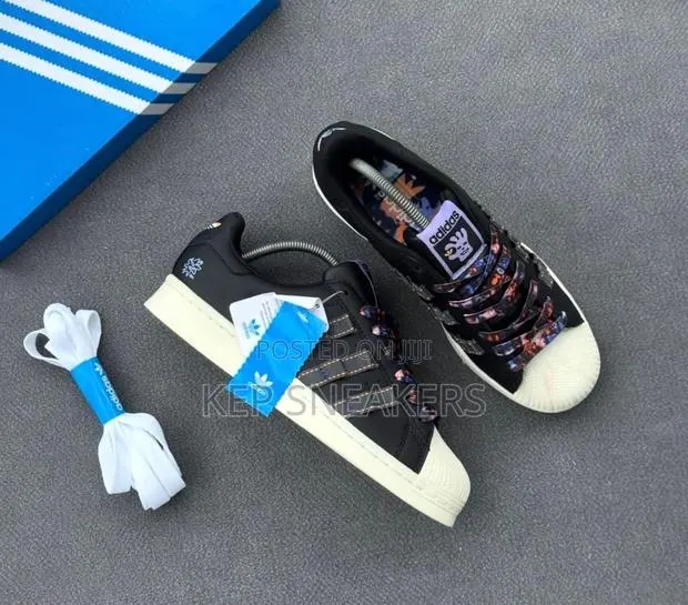 Superstar 'Core Black Ash Unity Orange’ · Photo 1