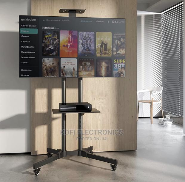 Simple to Travel With Tv Stand (Mount From 32-70) · Photo 1