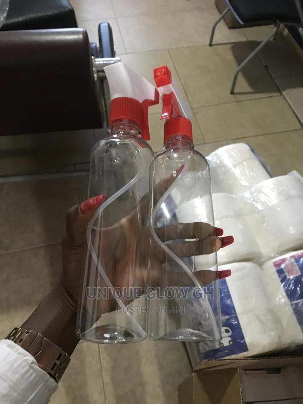 Spraying Rubbing Liquid Sanitizer Bottles With Sprayer · Photo 8