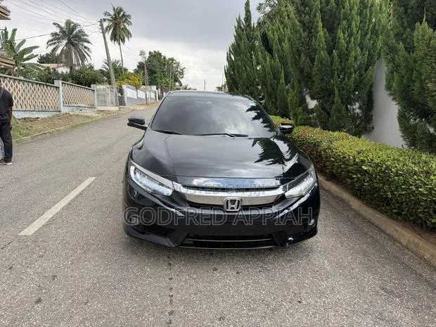 Honda Civic Touring 2dr Coupe (1.5L 4cyl) 2017 Black · Photo 1