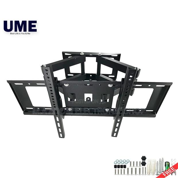 Compatible With Tv Between 32”-65” Screens · Photo 1