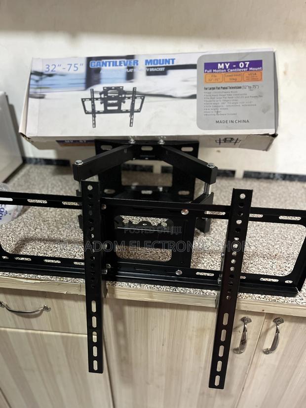 Suitable Fits Most Led Tvs 32”-70” · Photo 1