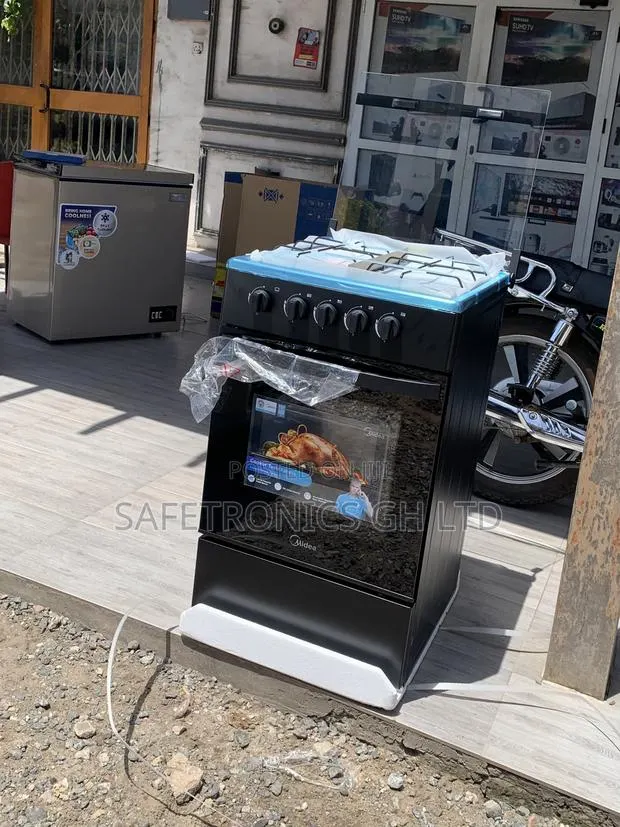 Secure Original Midea 4 Burner Gas Cooker Lack Mirror · Photo 1