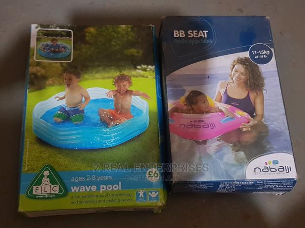 Inflatable Baby Swimming Seat and Wave Water Pool for Kids · Photo 1