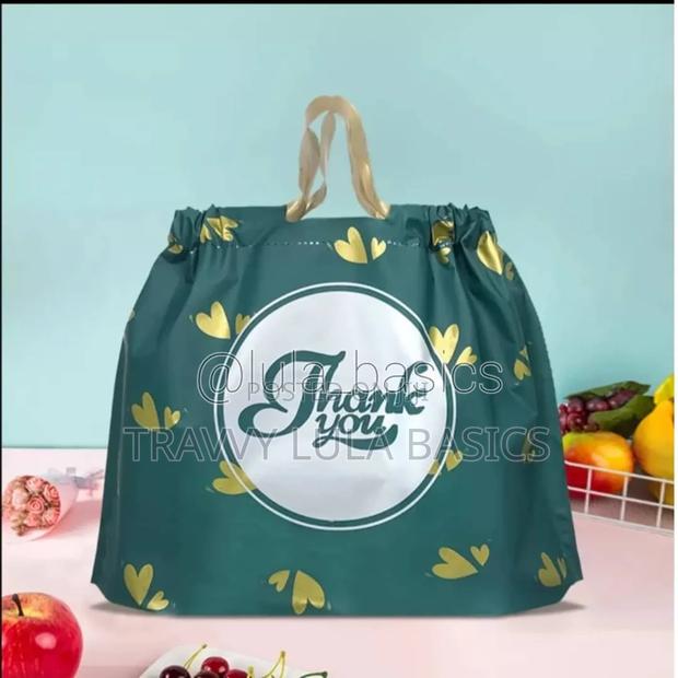 New Green Pullout Drawstring Shopping Bags · Photo 1