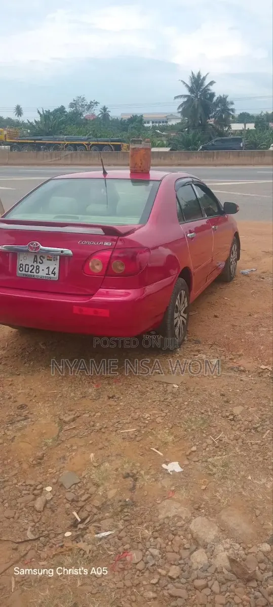 Toyota Corolla 2006 Red · Photo 1