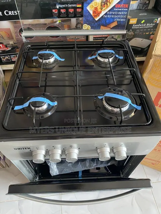 Brand New Unitek 4 Burner Cooker With Oven(50*50) · Photo 1