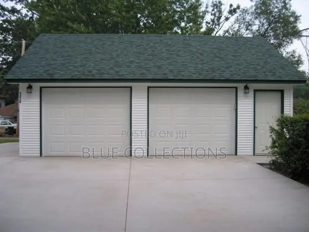 Morden Garage Door With Motor and Remote · Photo 1