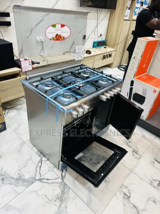 Call and Order for Midea Tech 5burner Oven Rotisserie Sliver · Photo 1