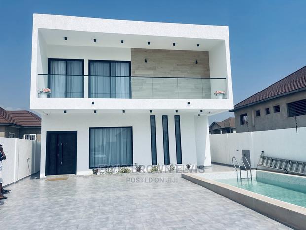 Furnished 4bdrm Mansion in Living Large, East Legon for Rent · Photo 1