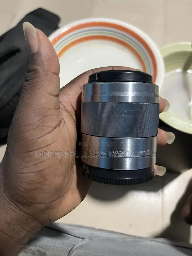 The Sony E-Mount 50mm F1.8 OSS Has a Fixed Focal Length of 50mm. · Photo 1