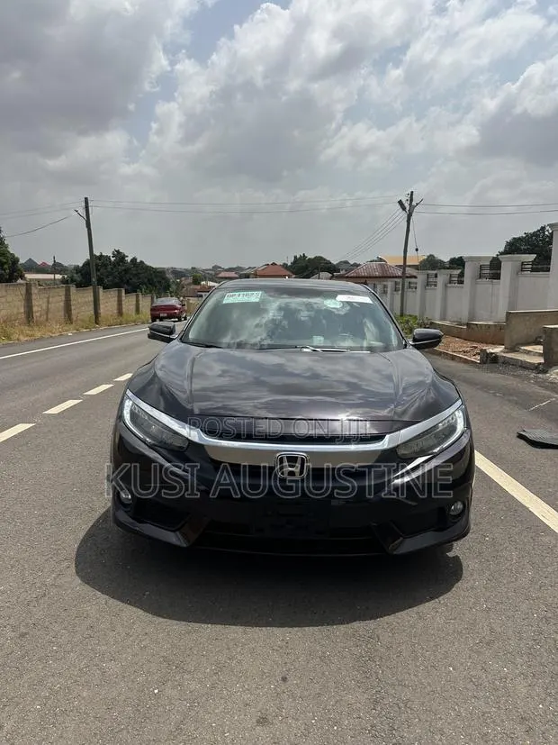 Honda Civic Touring 2dr Coupe (1.5L 4cyl) 2016 Black · Photo 1