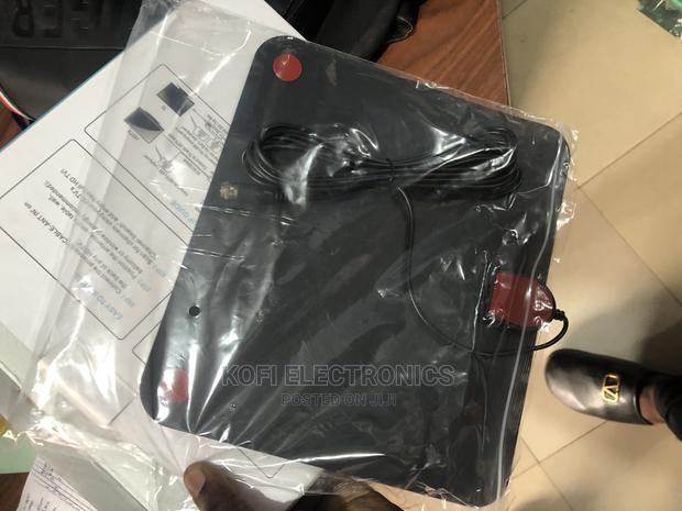 Unwrap, Plug It in and Scan Channels Indoor HD Antenna · Photo 1